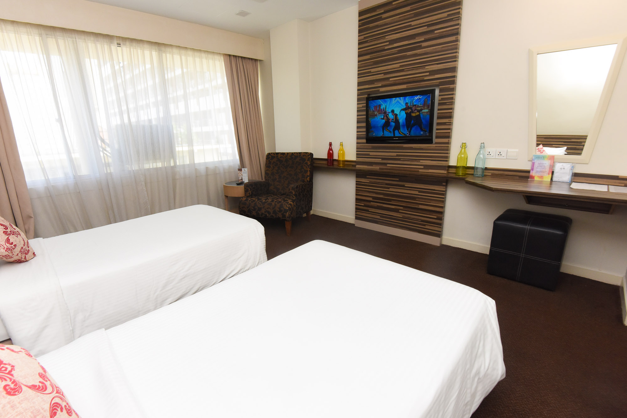 The Superior Twin room is designed to cater the needs of many with the comfortable twin beds, satellite television, complimentary WiFi, in-room safe and many more. Kick back and relax in this room for two. Dental kit, hair dryer and ironing facilities are available upon request.